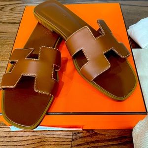 Hermes Oran Sandals in Golden Brown